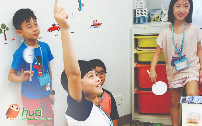 Students participating in an interactive Chinese lesson.